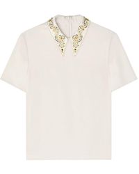 Versace - Top in raso envers con borchie - Lyst
