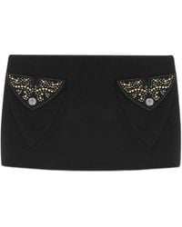Versace - Minigonna in lana con borchie - Lyst
