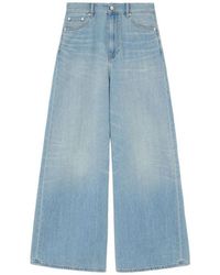 Ganni - Flared High Rise Jeans - Lyst