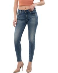 DIESEL - Skinny Mid Rise Jeans - Lyst