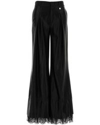 GIUSEPPE DI MORABITO - Flared Pleated Pants - Lyst