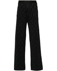 Palm Angels - Monogram-Jacquard Knitted Trousers - Lyst
