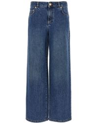 Moschino - Wide-Leg Denim Jeans With Teddy Button Closure - Lyst