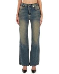 Moschino - Denim Flared High Rise Jeans - Lyst