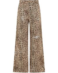 Amiri - Jet Set Animal Print Denim Pants - Lyst