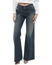DIESEL - Flared Mid Rise Jeans - Lyst