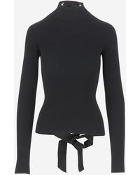 Balenciaga - Lace-Up Fitted Turtleneck Top - Lyst