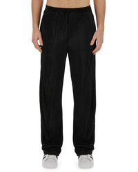 FAMILY FIRST - Elasticated Pleated Trousers - Lyst