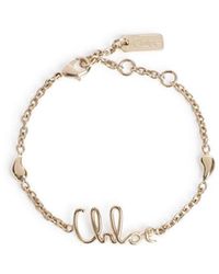 Chloé - Golden Vintage Logo Charm Bracelet - Lyst