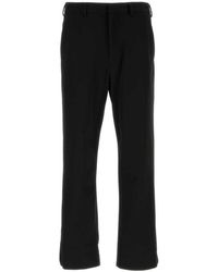Prada - Stretch Technical Fabric Pants - Lyst