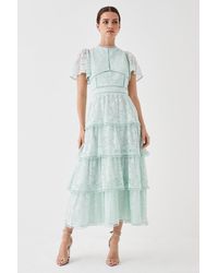 Coast - Petite Tiered Lace Dress With Flutter Sleeve & Trims - Lyst