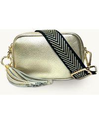 Apatchy London - The Mini Tassel Gold Leather Phone Bag With Black & Gold Chevron Strap - Lyst