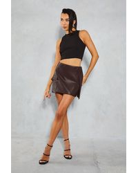 MissPap - Leather Look Asymmetric Waist Pocket Mini Skirt - Lyst