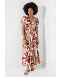 Joe Browns - Printed Maxi Dress With Wrap Neckline, Lurex Detail & Tassel Tie - Lyst