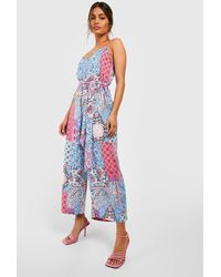Boohoo - Mixed Print Strappy Culotte Jumpsuit - Lyst