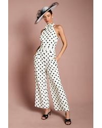 Coast - Lisa Tan Corsage Printed Halter Neck Jumpsuit - Lyst
