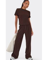 EGO - Wide Leg Button Down Shoulder Pads Ribbed Low Rise Joggers - Lyst