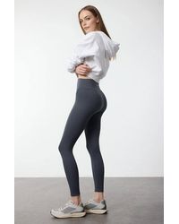 WOVCOR - Reflective Detail Brushed-Fabric Knitted Sports Leggings - Lyst