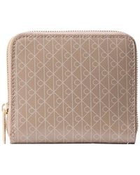 Calvin Klein - Emblem All Over Print Square Zip Around Wallet Desert - Lyst