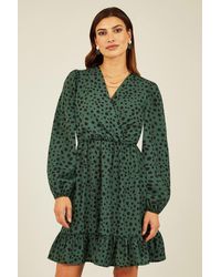 Mela - Green Dalmatian Print Long Sleeve Wrap Over Midi Dress - Lyst