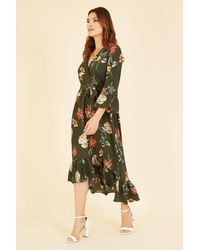 Yumi' - Green Floral Dip Hem Midi Dress - Lyst