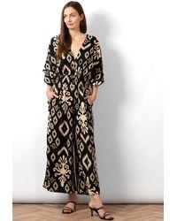 SARTA - Lyra Deep V-Neck Jumpsuit - Lyst