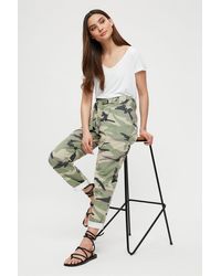Dorothy Perkins - Petite Camo Belted Trousers - Lyst