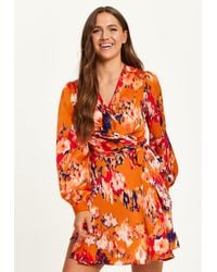 Liquorish - Abstract Print Mini Wrap Dress With Long Sleeves - Lyst