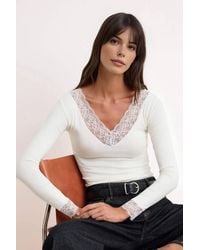 WOVCOR - V Neck Lace Detail Fitted Soft Knit Blouse W/ Long Sleeves - Lyst