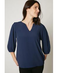 MAINE - Navy Notch Front 3/4 Sleeve Top - Lyst