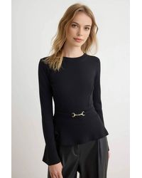 WOVCOR - Bicycle Neck Peplum Accessory Detail Long Sleeve Blouse - Lyst