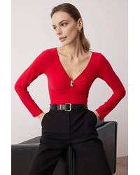 WOVCOR - V-Neck Fitted Knit Bodysuit W/ Ring Detail - Lyst