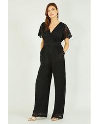 Yumi' - Black Angel Sleeve Lace Jumpsuit With Pockets - Lyst