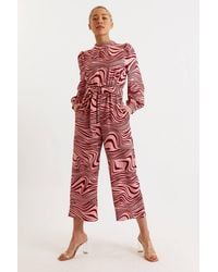 Louche - Gayane Zebra Pop Print Long Sleeve Jumpsuit - Lyst