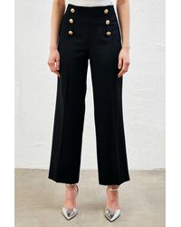 GUSTO - Gold Buttoned Wide Leg Trousers - Lyst