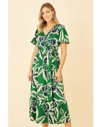 Yumi' - Green Tropical Leaf Print Wrap Midi Dress - Lyst