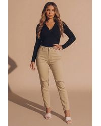 Femme Luxe - High Waisted Skinny Jeans With Rip Detail - Lyst