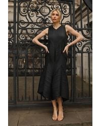 CY - Sculptural Pleated Midi Dress With Structured Panels - Lyst