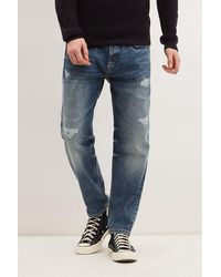 Burton - Tapered Stitch Repair Rip Jeans - Lyst