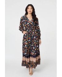 Izabel London - Floral Border Print Smocked Maxi Dress - Lyst