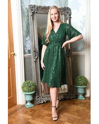 Yumi' - Green All Over Sequin Wrap Midi Dress - Lyst