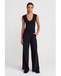 Dilvin - Wide-Leg Crepe Trousers - Lyst