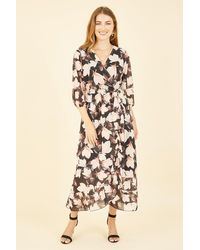 Yumi' - Black Blossom Wrap Midi Dress With 3/4 Sleeves - Lyst