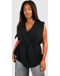 Boohoo - Plus Hammered Belted Wrap Peplum Top - Lyst