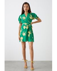 Dorothy Perkins - Petite Green Floral Print Shirred Cuff Wrap Mini Dress - Lyst