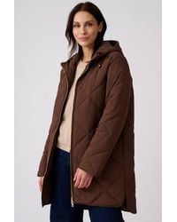 DAMART - Quilted Hooded Parka - Lyst