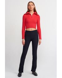 Dilvin - High-Waist Flare Pants With Slit - Lyst