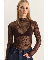 Bianco Lucci - Paisley Print Cut-Out Half Turtleneck Blouse - Lyst