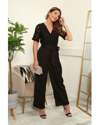 Double Second - Lace Wrap Short Sleeve Wide Leg Jumpsuit - Lyst