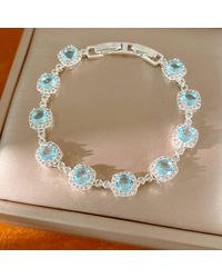 Peach Accessories - Elegant Aqua Crystal Halo Bracelet - Lyst